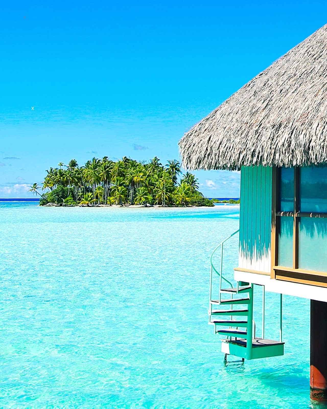Hotel over the blue water in Tahiti