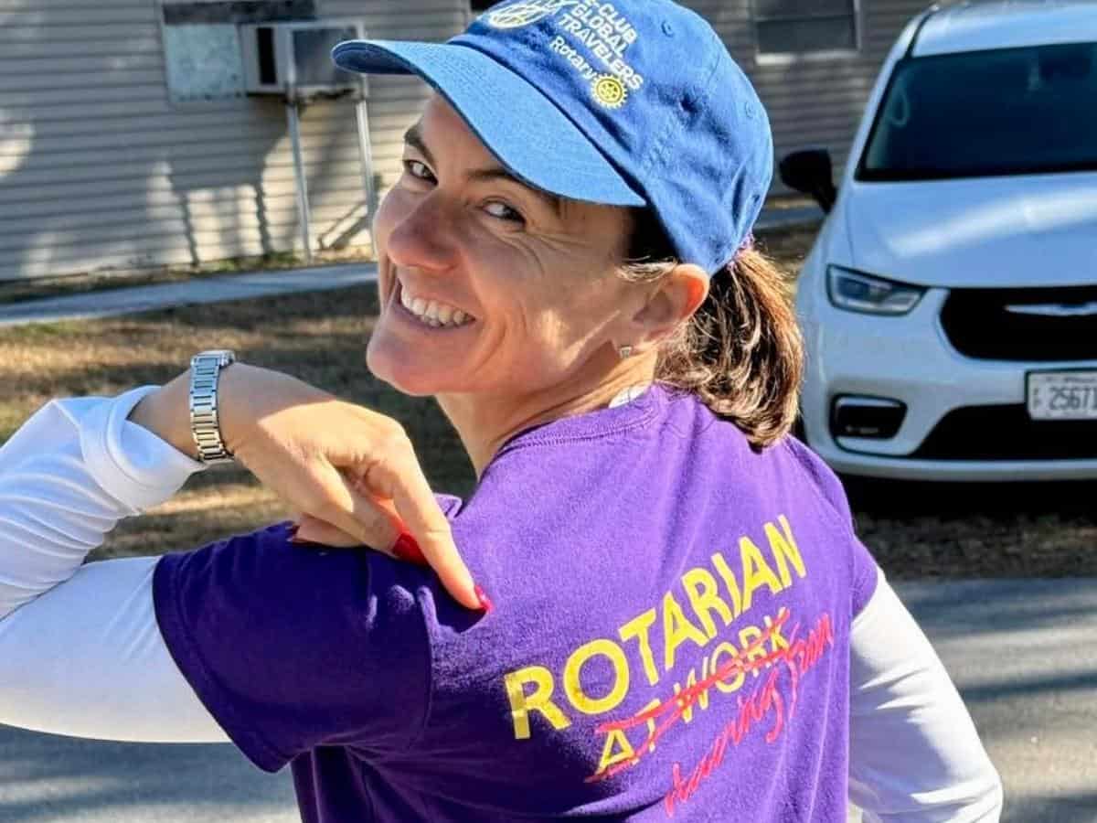 RotaranAtWork Rotarian with a Global Travelers hat and a Rotarian at Work tshirt